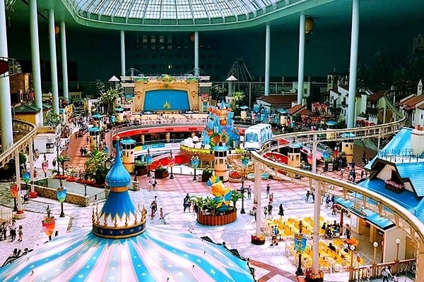 Lotte World indoor amusement park rides under glass dome